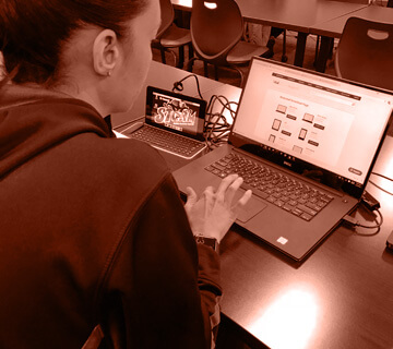 A student using a laptop